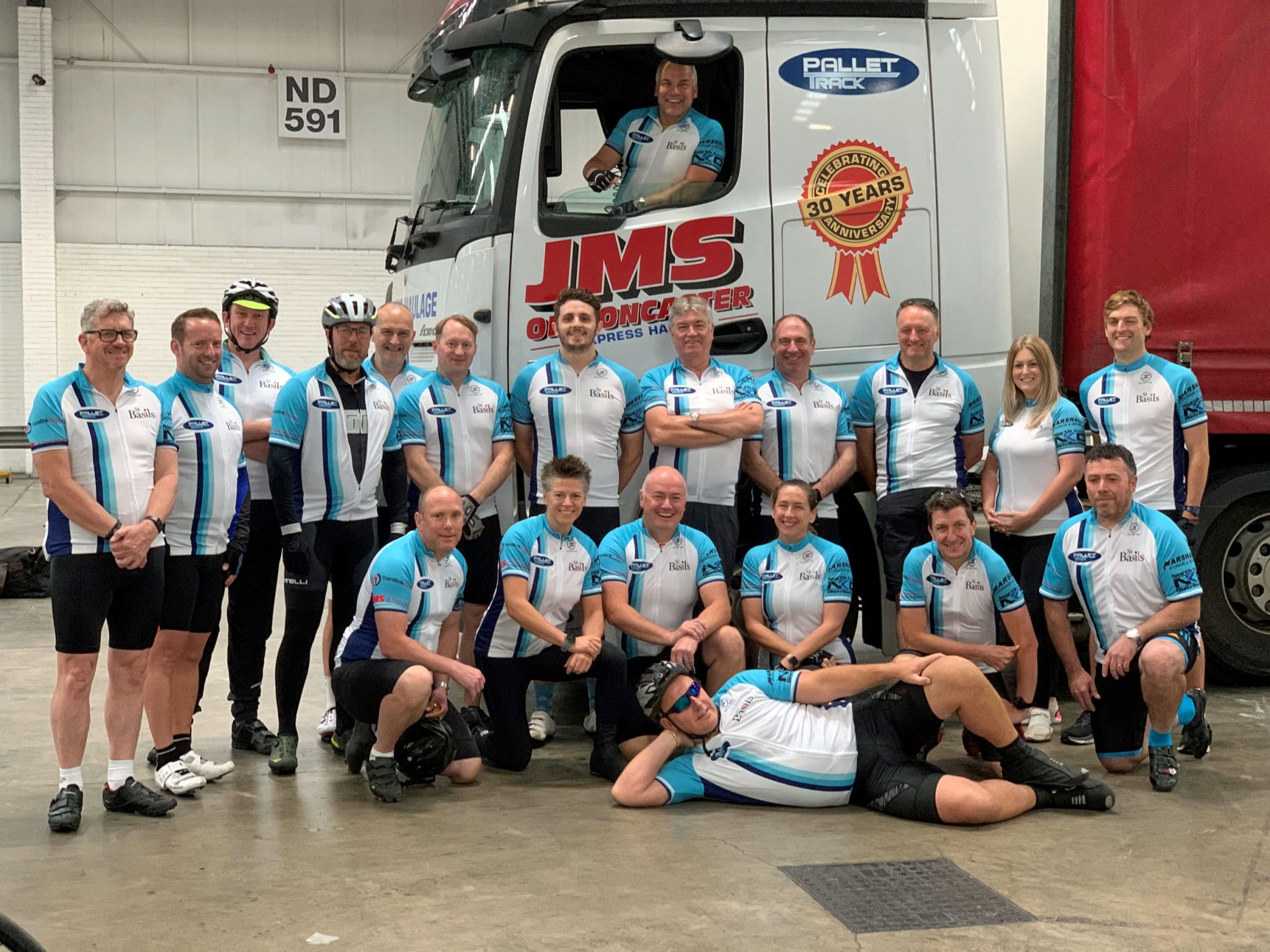 Pallet-Track cyclists brave torrential rain to ride 127 miles and raise £8,000 for St Basils thumbnail image